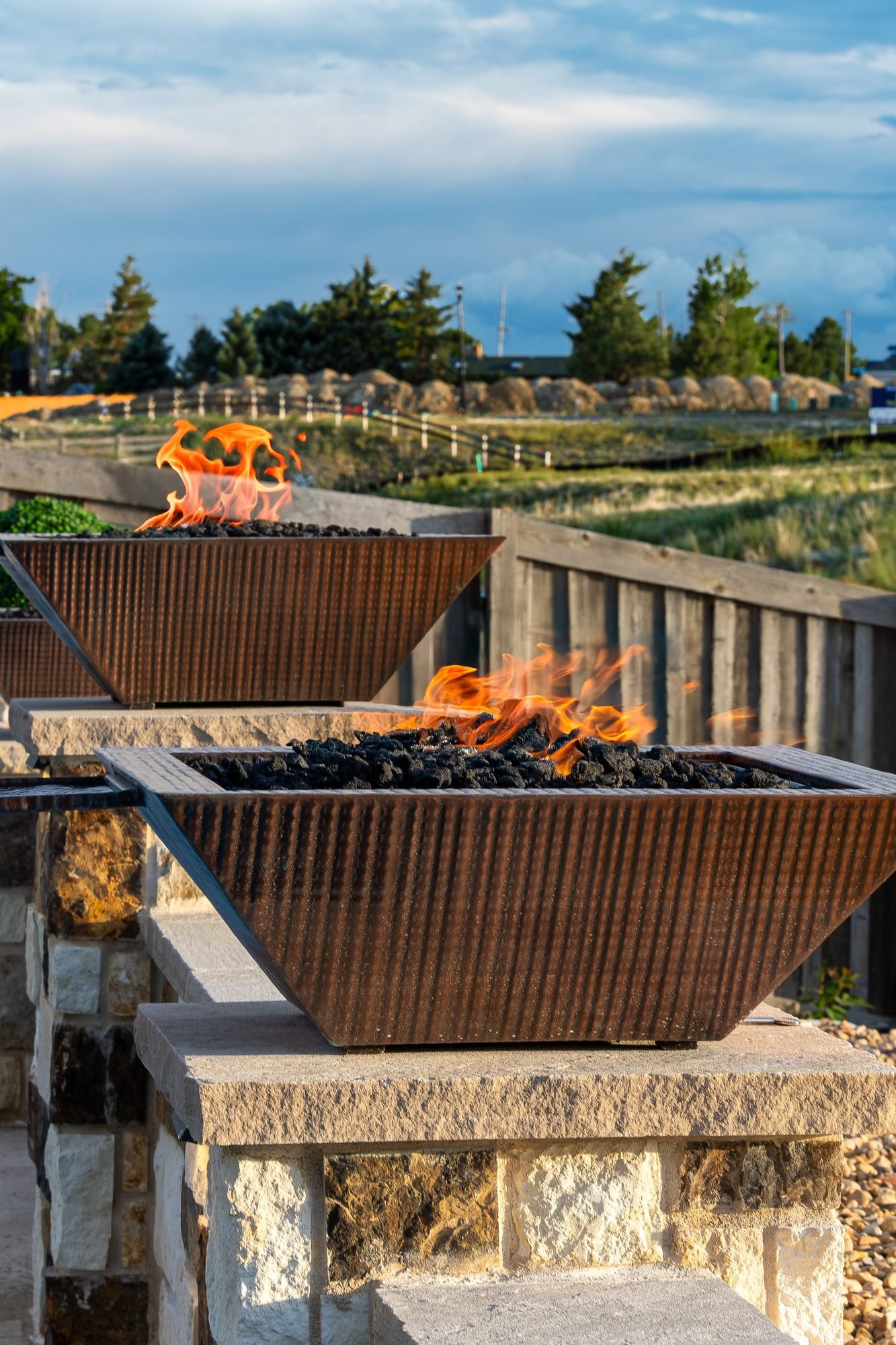 Poolside stonework and lighting detail, ORO Landscape Colorado
