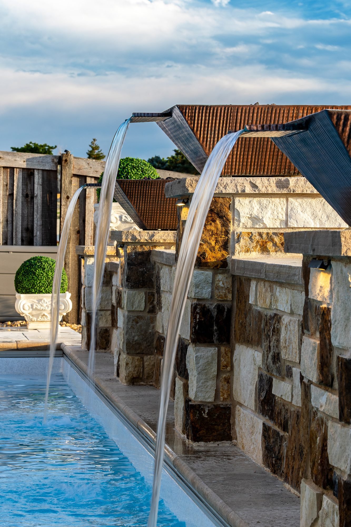 Pool and spa hardscape, ORO Landscape Colorado project