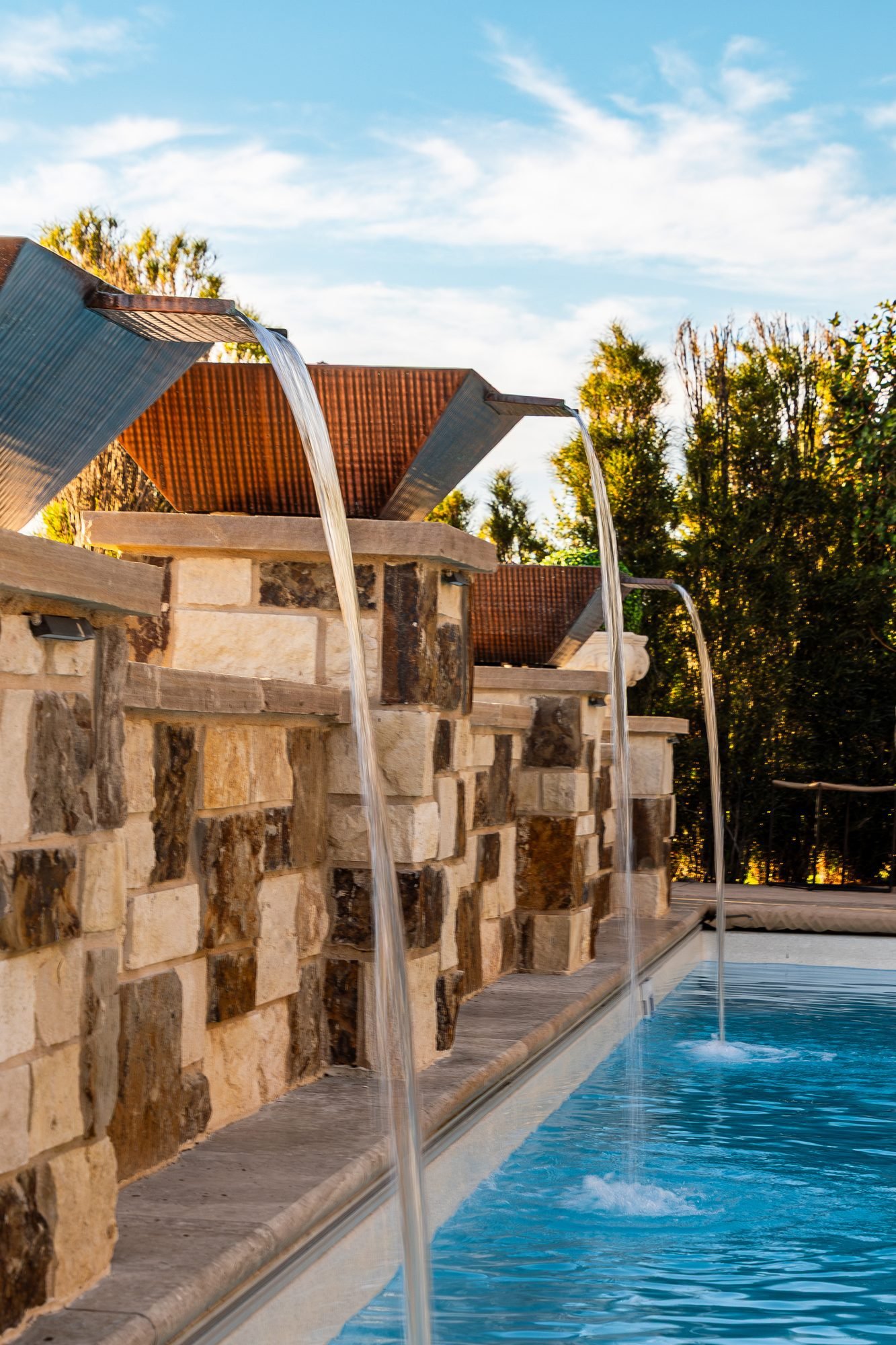 Pool hardscape detail, ORO Landscape Colorado project